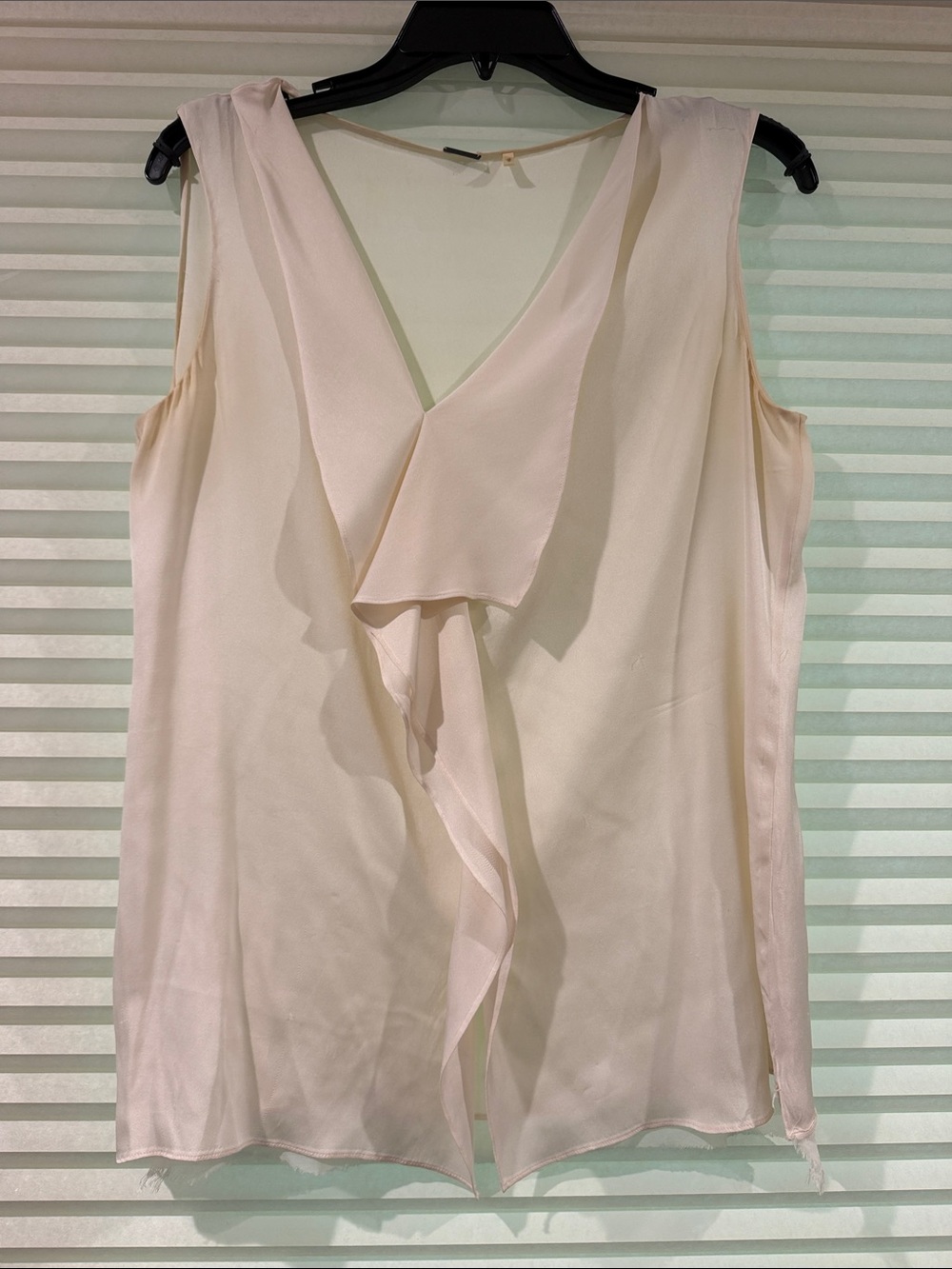 Ivory Sleeveless Ruffled V-Neck Blouse
